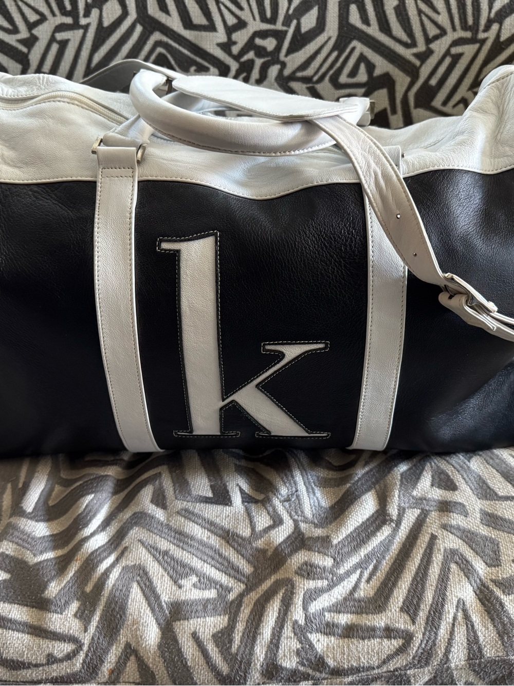 Black and White Leather Duffel Bag with 'K' Accent - Men